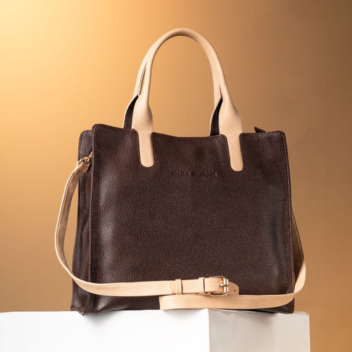 Dark leather clutch